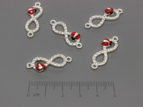 Безкрайност с калинка 27.5x10mm, отвор халки 1.7mm - 50 бр.
