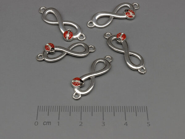 Безкрайност с калинка 28x10mm, отвор халки 1.7mm - 50 бр.