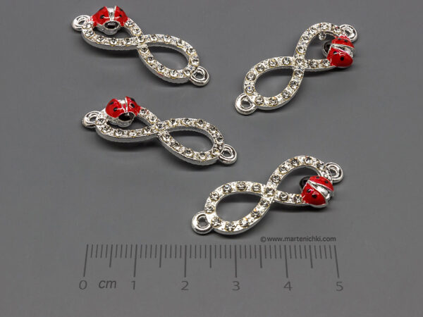 Безкрайност с калинка 33x11.5mm, халки 2mm - 50 бр.