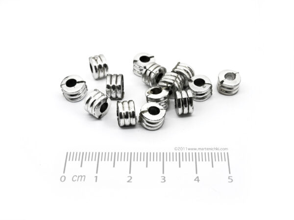 Цилиндър с 3 пръстена 9x6mm, отвор 4mm - 50g ≈ 220 бр.