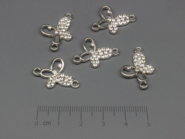 Пеперуда 22.5x15mm, отвор халки 2mm - 5 бр.