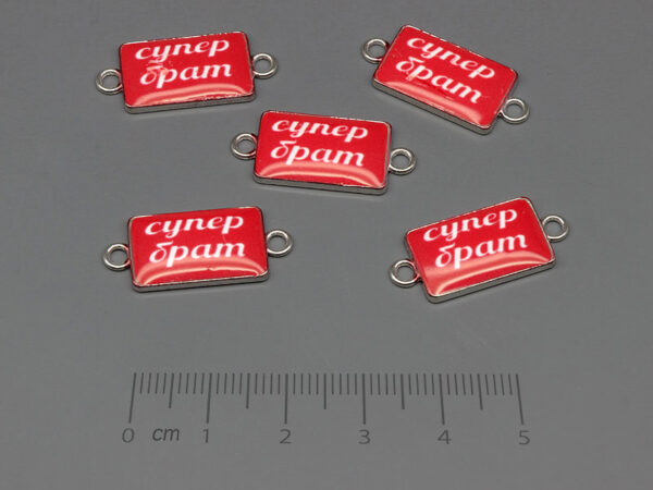 Плочка червена супер брат 24.5x11mm, отвор халки 2mm - 100 бр.