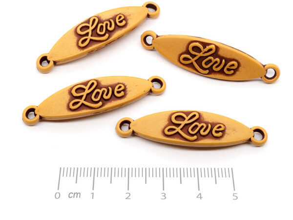 Плочка Love кафява 43x11x3mm, отвор халки 3mm - 50g ≈ 54 бр.